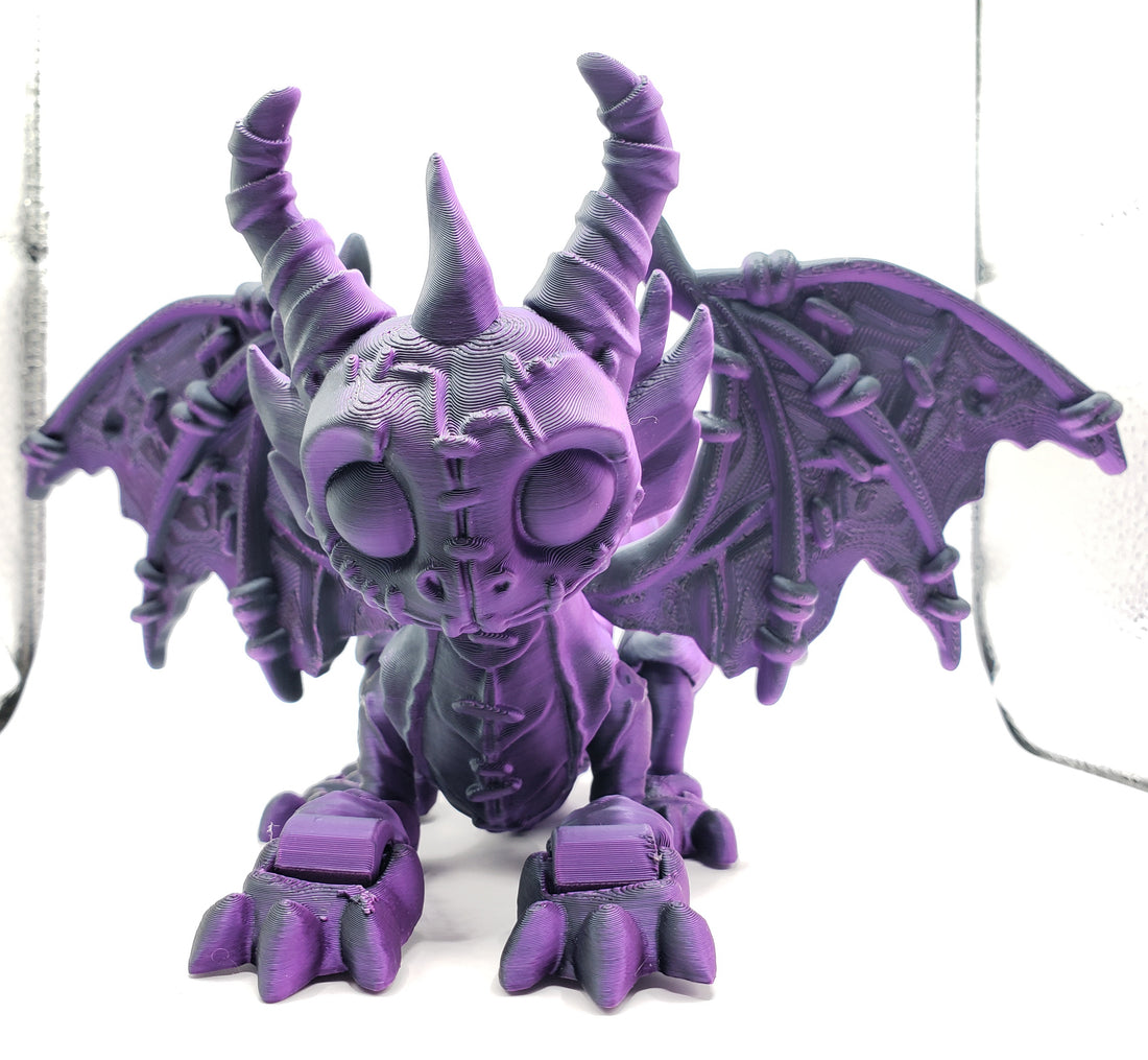 Purple and blcok dragon with stitches